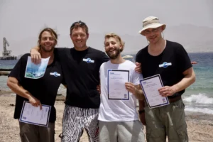 Become a dive instructor in Eilat — PADI Course Director teaching on the Red Sea